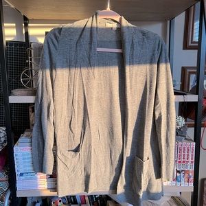 Long sleeved, light grey cardigan